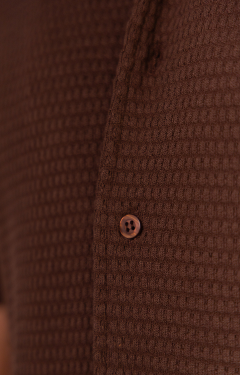 Jacquard com relevo de waffle.